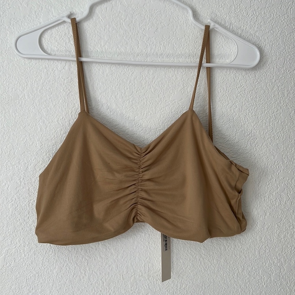 Two piece set never worn with tags on - stretchy material with drawstring skirt
